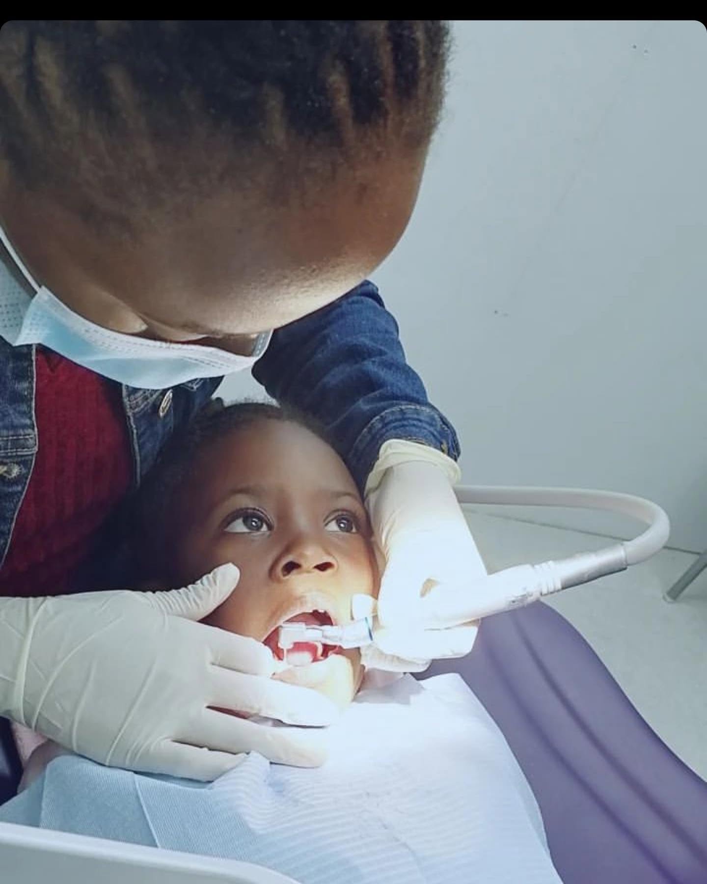 A child receiving gentle dental care at New Dawn Dental Studio